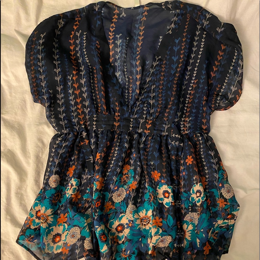 Cute sheer thin top.